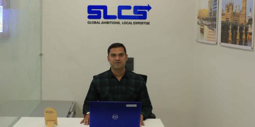A SLCS Visa Counsellor waiting to service work visa applicant