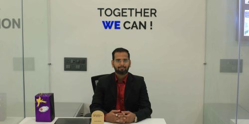 An SLCS Employee ready to help a work visa applicant